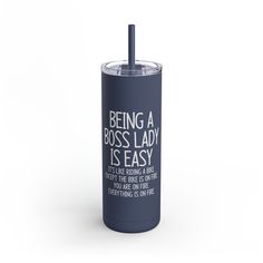 a blue tumbler with the words being a boss lady is easy