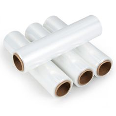 three rolls of clear plastic film on white background