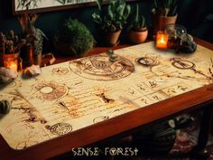 a wooden table topped with lots of different types of items and plants on top of it