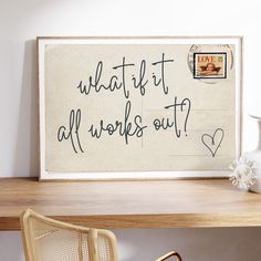 a wooden desk topped with a chair and a framed sign that says what if all works out?