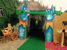 an entrance decorated with fake animals and decorations