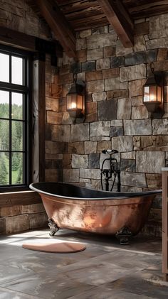 an old fashioned copper bathtub in a rustic bathroom with stone walls and flooring