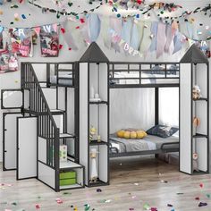 there is a bunk bed with stairs in the room and confetti on the wall