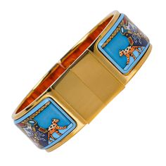 Mightychic offers a guaranteed authentic Hermes Vintage Snow Leopards Enamel Clic Clac bracelet 65 PM. This stunning rare Hermes bracelet is a collectors find. Depicting snow leopards and a tiger on a bright blue background with gold plated hardware. A classic bracelet! final sale SIZE S BRACELET MEASURES: WIDTH 1.5" CONDITION: MINT Hermes Bracelet, Classic Bracelets, Vintage Hermes, Enamel Bracelet, Bracelet Vintage, Snow Leopard, Leopards, Bright Blue, Blue Backgrounds