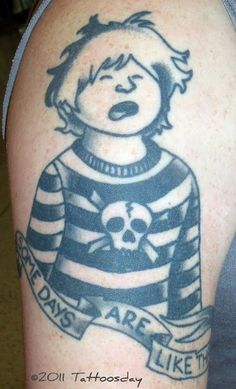 a person with a tattoo on their arm