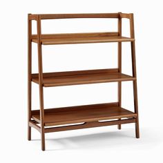 a wooden shelf with three shelves on each side and one shelf below it, against a white background