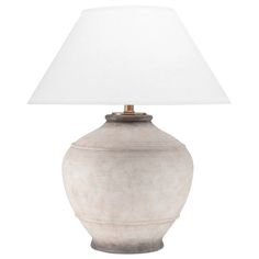 a lamp with a white shade on it