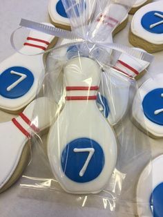 decorated cookies in the shape of bowling pins