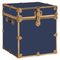 a large green trunk with gold trim and handles