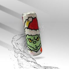 a can cooler with an angry bird on it's side and water splashing around