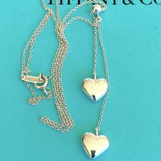 Double Puffed Heart Necklace. One Hangs Longer Than The Other. 16 In Chain. Valentine's Day Heart Pendant Silver Chain Jewelry, Valentine's Day Heart Pendant With Silver Chain, Heart-shaped Chain Necklace For Valentine's Day, Turquoise Heart-shaped Necklace For Gift, Valentine's Day Gold-tone Heart Pendant Necklace, Puffed Heart, Tiffany & Co., Heart Necklace, Womens Jewelry Necklace