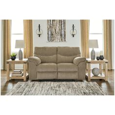 a living room scene with focus on the reclining sofa