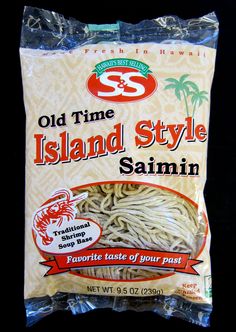 a bag of old time island style sammin noodles on a black background with a red ribbon around it