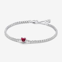 Go for timeless style with a pop of colour with the Red Sparkling Heart Tennis Bracelet. One heart-shaped red man-made crystal forms the center of this sterling silver tennis bracelet. Adjustable and dynamic, the rest of the bracelet features clear sparkling bead-set stones. One sparkling stone dangles from the end of the clasp. With its delicate heart motif, this Pandora heart tennis bracelet is a sweet gift for the one you love. - Pandora Red Sparkling Heart Tennis Bracelet - Sterling silver / Valentine's Day Formal Heart Cut Bracelet, Classic Cubic Zirconia Bracelets For Valentine's Day, Elegant Sterling Silver Bracelet For Valentine's Day, Elegant Heart-shaped Tennis Bracelet For Valentine's Day, Elegant Crystal Heart Bracelet For Valentine's Day, Classic Heart-shaped Cubic Zirconia Bracelet, Elegant Round Crystal Bracelet For Valentine's Day, Classic Heart Cut Bracelets For Valentine's Day, Heart-shaped Tennis Bracelet For Valentine's Day