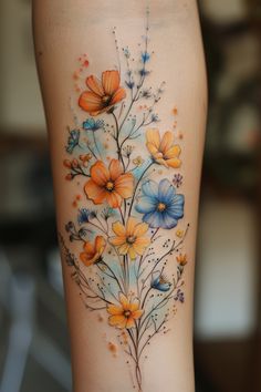 a woman's thigh with flowers painted on it