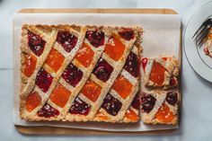 a table topped with slices of fruit pie