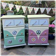 two colorful dressers sitting next to each other