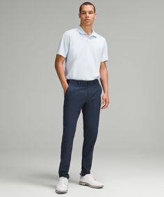 From first swing to the final round, these golf pants are at the top of their game. Integrated ventilation and stretch fabric deliver comfort that lasts on and off the course. Designed for Golf. Streamlined fit that skims glutes and thighs. Stretch elastic panels on the waistband. Ventilated gusset. Secure back pockets fit your phone and score cards. Small drop-in pocket on the right-hand side for golf tees. Flip up the cuffs to reveal reflective details. Golf Fits, Golf Tees, Golf Pants, Jogger Shorts, Business Casual Outfits, Hoodie Top, Mens Trousers, Mens Bottom, Jacket Tops