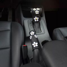 the interior of a car with flowers on it