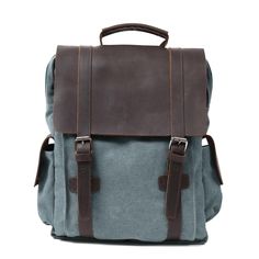 Elevate your everyday look with this small canvas backpack. This classic rucksack blends rugged charm with practical features for a stylish and functional accessory. Rustic Elegance: Crafted from blue cotton canvas and genuine leather, this backpack adds a vintage touch to any outfit. Modern Convenience: Despite its retro design, this backpack includes waterproof protection and quilted pockets for your phone and laptop. Unique Character: The vintage materials age beautifully, giving each backpac Phone And Laptop, Leather Backpack Handbag, Tactical Wallet, Leather School Backpack, Fishing Shoes, Vintage Backpacks, Women Leather Backpack, Canvas Messenger Bag, Small Canvas