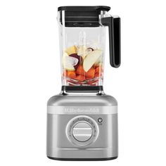 a blender filled with fruit and vegetables