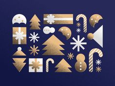 gold and white christmas decorations on a blue background