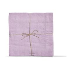 a purple napkin tied up with twine