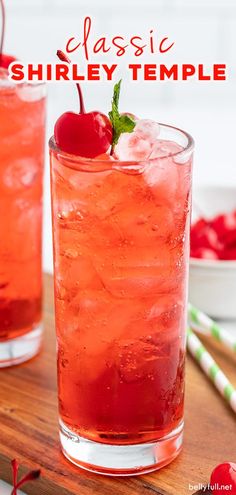 two glasses filled with ice and cherries