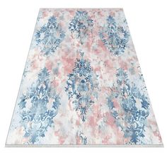 an area rug with blue, pink and white flowers on the ground in front of a white background