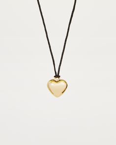 Wear your heart on your sleeve with this stylish Silver Heart Cord Necklace! The perfect accessory for any daring adventurer, the sleek design and slim cord will draw attention to your daring fashion sense. Materials: platinum plated brass Measurements: 360mm/14" in length, 55mm/2.2" in extension length En Route Jewelry, Heart On Your Sleeve, Heart Hair, Gold Collar, Brass Necklace, Bhutan, Pearl Flower, Cord Necklace, Heart On