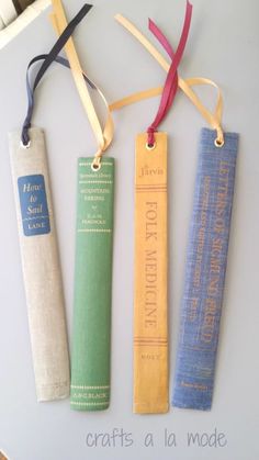 three bookmarks with ribbons attached to them