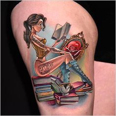 a woman is sitting on top of books and holding an open book with a rose in her hand