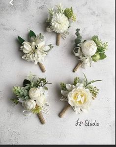 the bridal bouquets are arranged in four different shapes and sizes, including white flowers