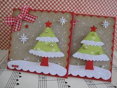 two christmas cards with trees on them