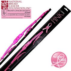 the pink ribbon is on top of two skis with black and white lettering that says,