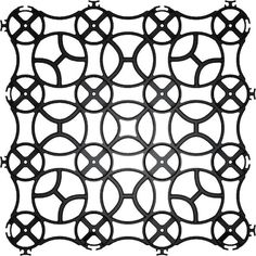 a black and white image of an intricate design on a sheet of paper with circles in the center