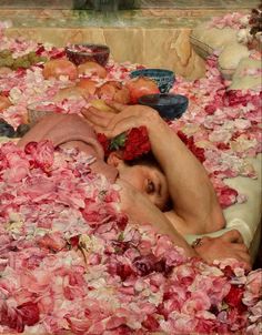 a painting of a woman laying down in a bed of flowers and apples with her eyes closed