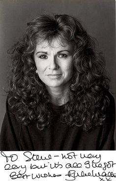 black and white photograph of woman with long curly hair smiling at the camera, text reads i saw no net view