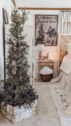 a christmas tree is in the corner of a room