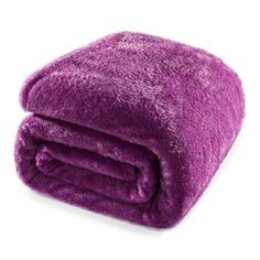 a purple blanket folded on top of each other