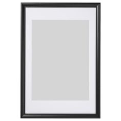 a black and white frame on a wall with an empty space for the image to be taken