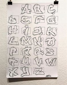 a piece of paper with letters drawn on it