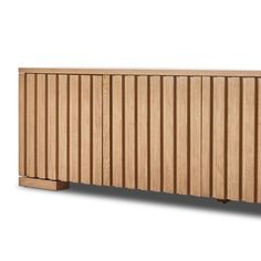 the sideboard is made out of wood and has vertical slats on it's sides