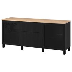 the sideboard is black and has two doors on one side, and three drawers on the other