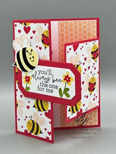 a close up of a card with a bee on it