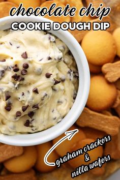 chocolate chip cookie dough dip with graham crackers and nuts on the side in a white bowl