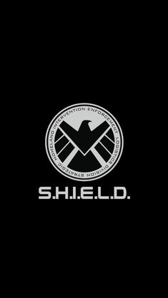 the shield logo on a black background with white letters and an eagle in the center