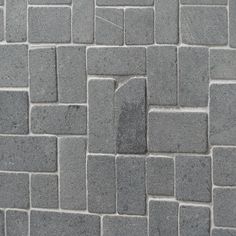 an image of a brick wall that looks like it is made out of cement