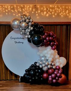 balloons are arranged in the shape of a wreath