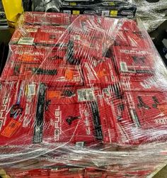 many red boxes are wrapped in plastic